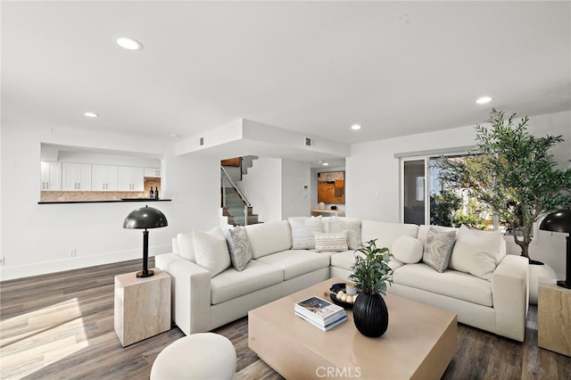 33 Seton Rd, Irvine, CA 92612 - living area with recessed lighting, dark wood-style flooring, and stairs