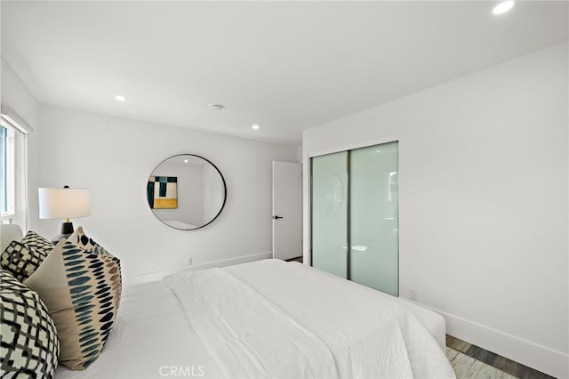 33 Seton Rd, Irvine, CA 92612 - bedroom featuring recessed lighting, wood finished floors, and a closet