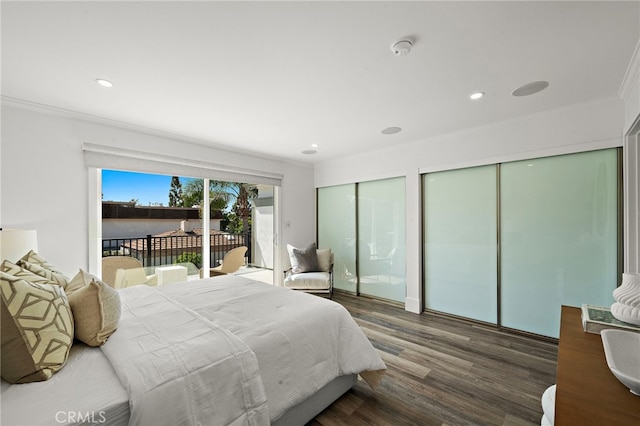 33 Seton Rd, Irvine, CA 92612 - bedroom featuring multiple closets, access to exterior, ornamental molding, wood finished floors, and recessed lighting