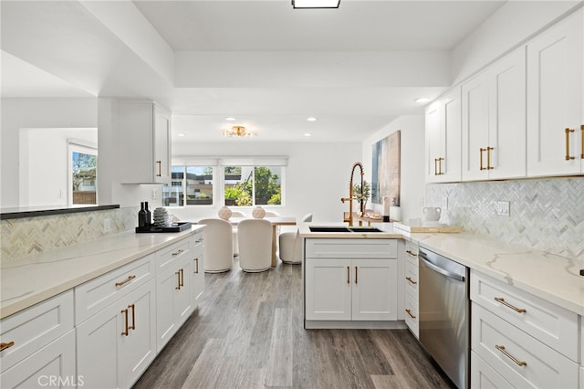 33 Seton Rd, Irvine, CA 92612 - kitchen with dishwasher, wood finished floors, a peninsula, white cabinetry, and recessed lighting