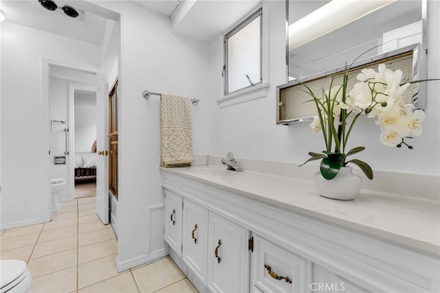 9700 Nita Ave, Chatsworth, CA 91311 - bathroom featuring tile patterned floors and vanity