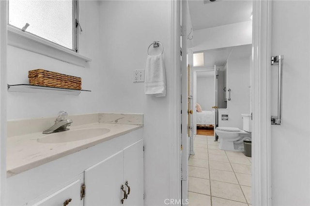 9700 Nita Ave, Chatsworth, CA 91311 - bathroom with tile patterned flooring, vanity, and ensuite bathroom