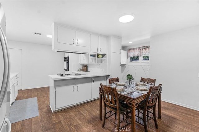 9700 Nita Ave, Chatsworth, CA 91311 - dining area with dark wood-style floors