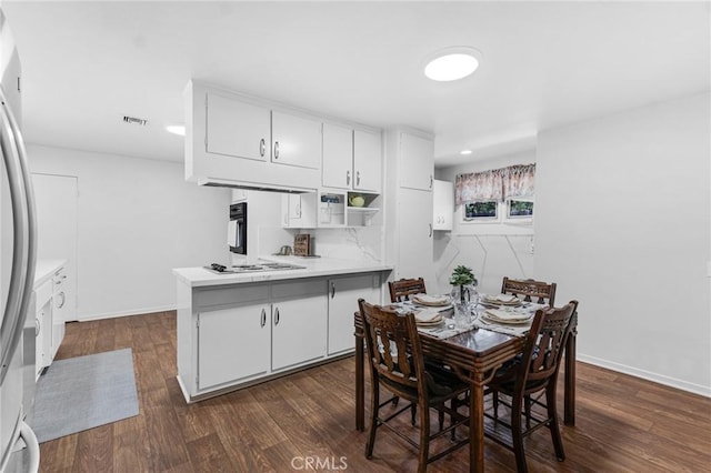 9700 Nita Ave, Chatsworth, CA 91311 - dining area featuring dark wood-style flooring