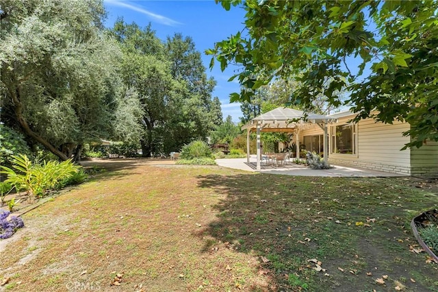 9700 Nita Ave, Chatsworth, CA 91311 - view of grassy yard with a pergola and a patio