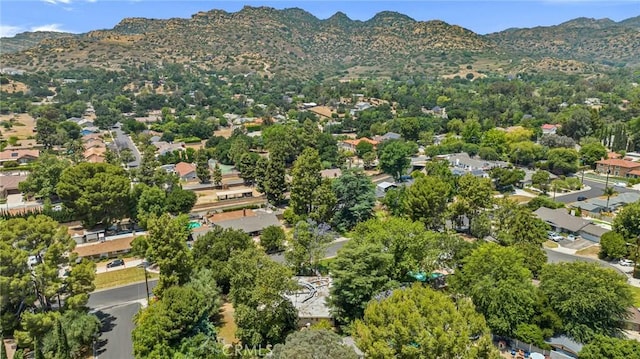 9700 Nita Ave, Chatsworth, CA 91311 - aerial view of property and surrounding area with mountains and nearby suburban area