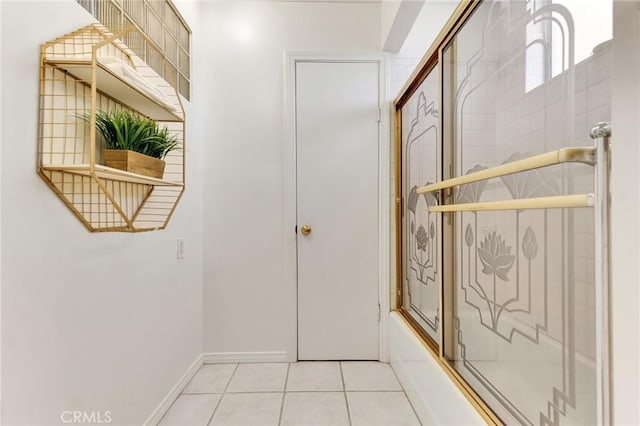 9700 Nita Ave, Chatsworth, CA 91311 - hallway with light tile patterned flooring and baseboards