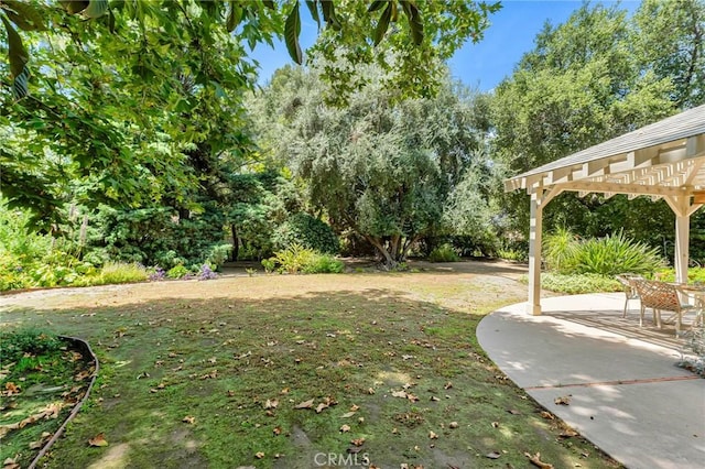 9700 Nita Ave, Chatsworth, CA 91311 - view of grassy yard featuring a pergola and a patio
