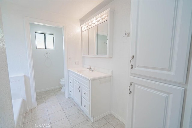 44623 Gingham Ave, Lancaster, CA 93535 - bathroom with vanity, tile patterned flooring, and a tub to relax in