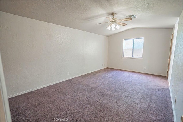 44623 Gingham Ave, Lancaster, CA 93535 - unfurnished room with lofted ceiling, ceiling fan, a textured wall, a textured ceiling, and carpet flooring