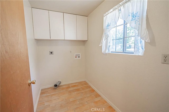 44623 Gingham Ave, Lancaster, CA 93535 - laundry area featuring cabinet space, light wood-style floors, hookup for a washing machine, and hookup for an electric dryer