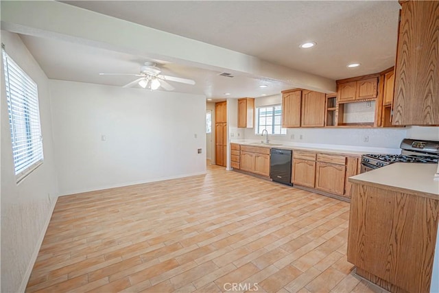 44623 Gingham Ave, Lancaster, CA 93535 - kitchen featuring dishwasher, stainless steel gas range, open shelves, light wood-type flooring, and recessed lighting