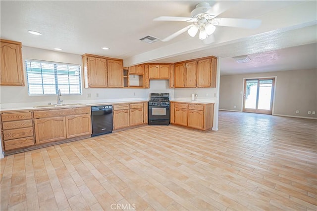 44623 Gingham Ave, Lancaster, CA 93535 - kitchen featuring black dishwasher, gas range, open shelves, light wood-style floors, and light countertops