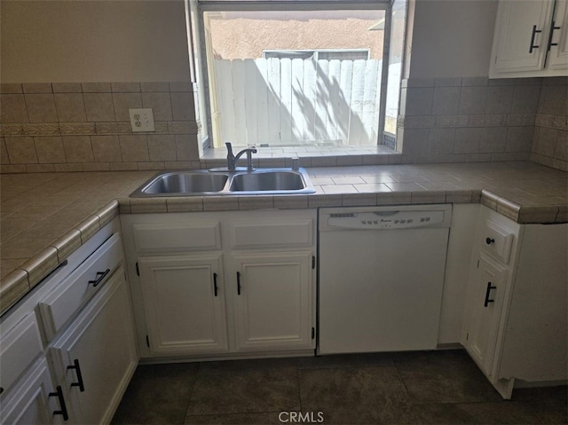 15171 San Jose Dr, Victorville, CA 92394 - kitchen with dishwasher, white cabinets, tile countertops, backsplash, and dark tile patterned floors