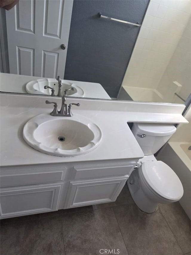 15171 San Jose Dr, Victorville, CA 92394 - bathroom with tile patterned floors, vanity, and shower / washtub combination
