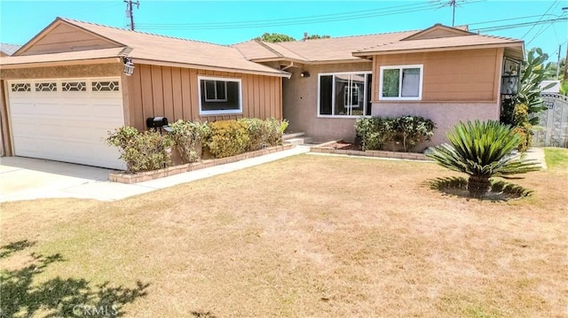 13724 Lancelot Ave, Norwalk, CA 90650 - ranch-style house featuring an attached garage, a front lawn, concrete driveway, and board and batten siding