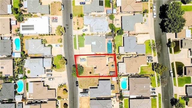 13724 Lancelot Ave, Norwalk, CA 90650 - aerial view of residential area featuring a pool and property boundaries highlighted