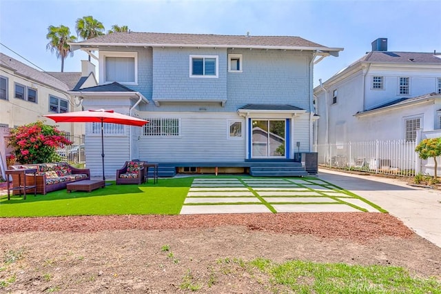 715 S Norton Ave, Los Angeles, CA 90005 - rear view of property featuring an outdoor living space and entry steps