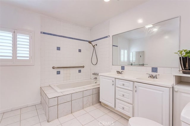 715 S Norton Ave, Los Angeles, CA 90005 - bathroom featuring tile patterned flooring, tiled shower / bath, and double vanity