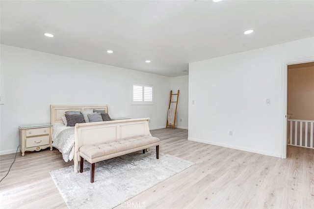 715 S Norton Ave, Los Angeles, CA 90005 - bedroom with light wood finished floors and recessed lighting