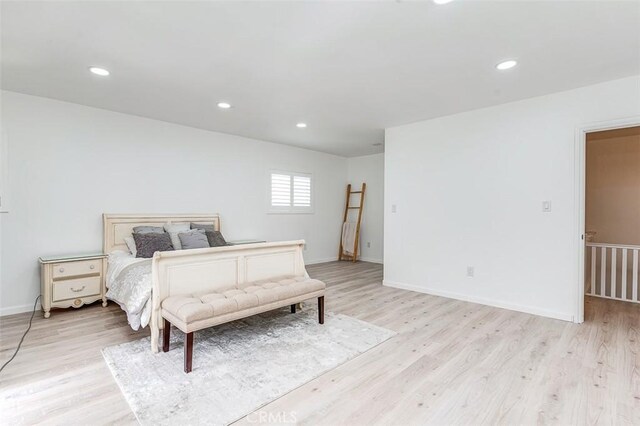 715 S Norton Ave, Los Angeles, CA 90005 - bedroom featuring light wood finished floors and recessed lighting