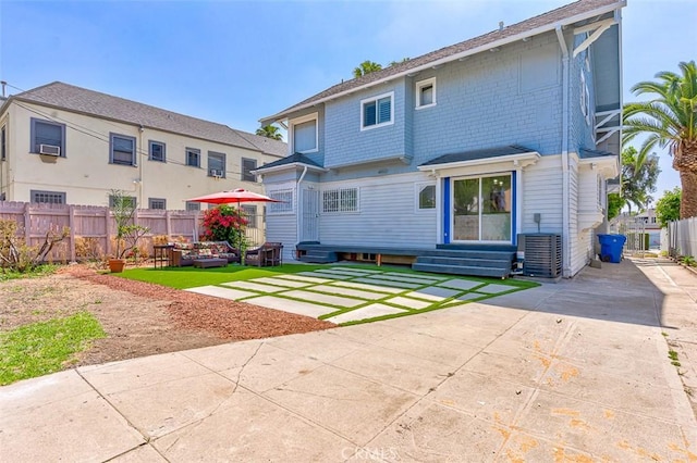 715 S Norton Ave, Los Angeles, CA 90005 - back of house featuring entry steps and a patio area