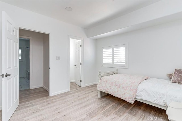 715 S Norton Ave, Los Angeles, CA 90005 - bedroom with light wood-style flooring
