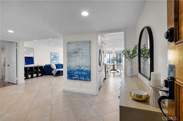 1215 Brockton Ave Unit 203, Los Angeles, CA 90025 - hall with recessed lighting, light tile patterned floors, and crown molding