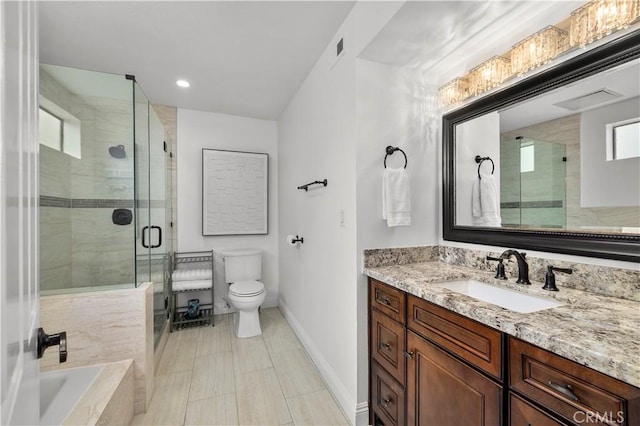1215 Brockton Ave Unit 203, Los Angeles, CA 90025 - bathroom with vanity, a shower stall, and tiled bath