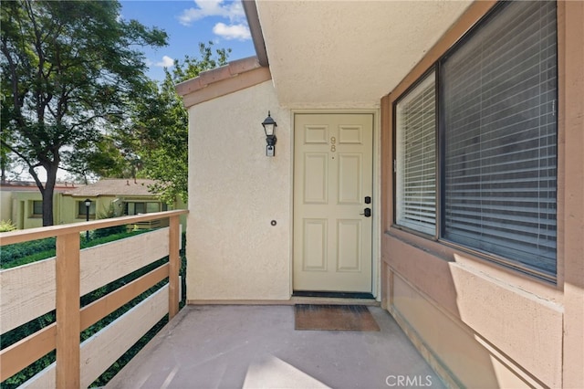 22832 Hilton Head Dr Unit 98, Diamond Bar, CA 91765 - doorway to property featuring stucco siding
