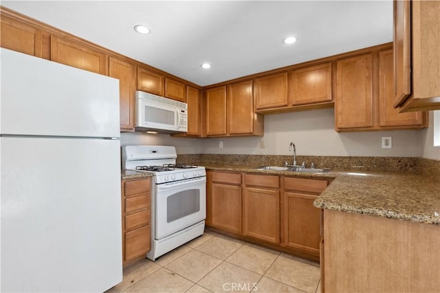 1339 Massachusetts Ave Unit 101, Riverside, CA 92507 - kitchen featuring white appliances, light tile patterned floors, brown cabinets, and recessed lighting