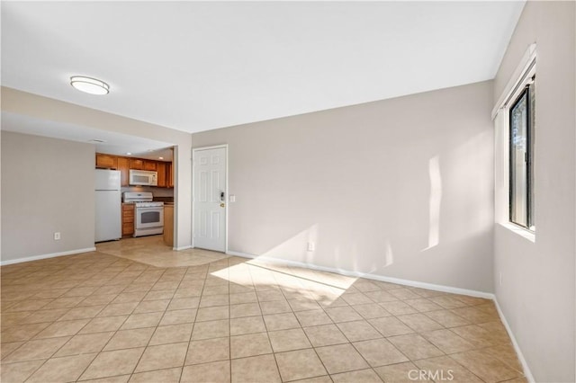 1339 Massachusetts Ave Unit 101, Riverside, CA 92507 - unfurnished living room featuring light tile patterned flooring