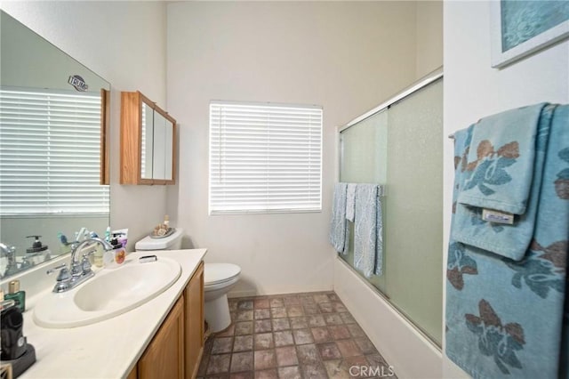 2908 Owens Way, Rosamond, CA 93560 - full bath with vanity, combined bath / shower with glass door, and stone finish flooring