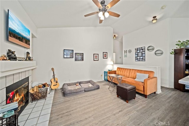 2908 Owens Way, Rosamond, CA 93560 - living area with ceiling fan, lofted ceiling, a fireplace, and wood finished floors