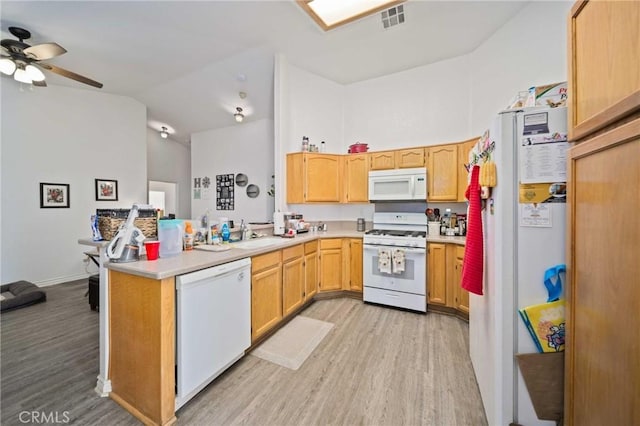 2908 Owens Way, Rosamond, CA 93560 - kitchen with white appliances, light wood finished floors, a peninsula, light countertops, and ceiling fan