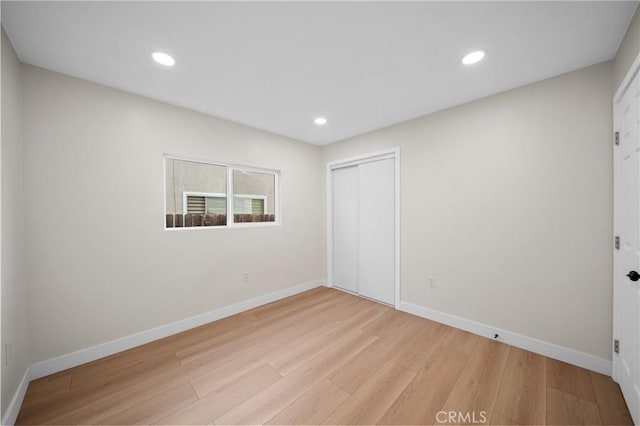 15604 Sharonhill Dr, Whittier, CA 90604 - unfurnished bedroom with light wood finished floors, a closet, and recessed lighting