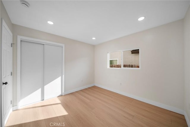 15604 Sharonhill Dr, Whittier, CA 90604 - unfurnished bedroom featuring wood finished floors, a closet, and recessed lighting