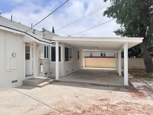 603 N Hawthorn St, Anaheim, CA 92805 - view of patio / terrace featuring an attached carport