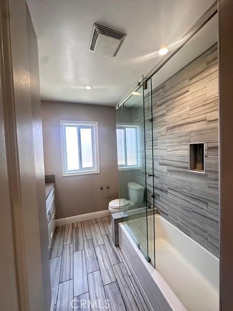 603 N Hawthorn St, Anaheim, CA 92805 - full bathroom with enclosed tub / shower combo and vanity