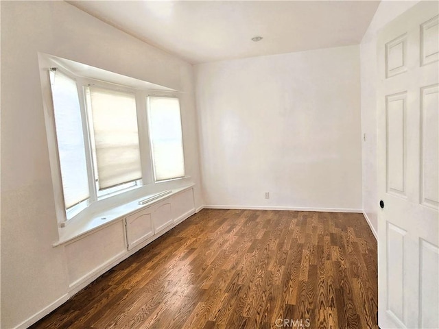 3033 N Main St, Los Angeles, CA 90031 - spare room with dark wood-type flooring and baseboards