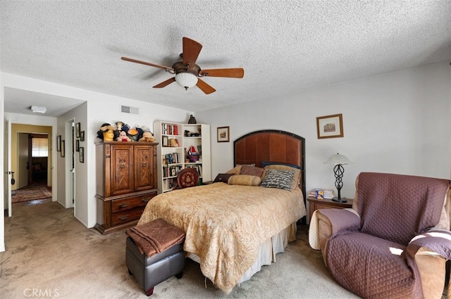 1924 E Rancho Culebra Dr, Covina, CA 91724 - bedroom with light carpet, a ceiling fan, and a textured ceiling