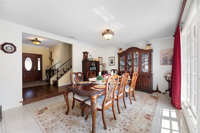 1924 E Rancho Culebra Dr, Covina, CA 91724 - dining space featuring stairs, light tile patterned flooring, and ornamental molding