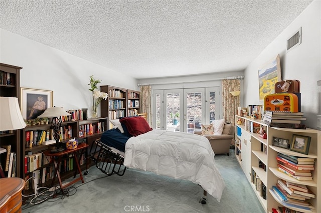 1924 E Rancho Culebra Dr, Covina, CA 91724 - bedroom with french doors, carpet, a textured ceiling, and access to outside