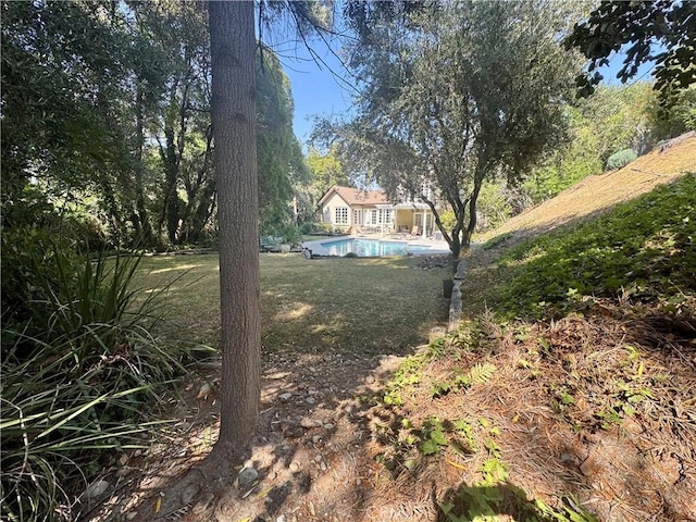 1924 E Rancho Culebra Dr, Covina, CA 91724 - view of green lawn with an outdoor pool