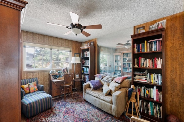 1924 E Rancho Culebra Dr, Covina, CA 91724 - sitting room featuring ceiling fan, a textured ceiling, plenty of natural light, and wallpapered walls