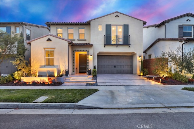 109 Ritual, Irvine, CA 92618 - mediterranean / spanish house with a balcony, a tiled roof, stucco siding, driveway, and an attached garage