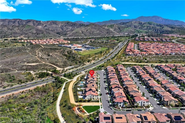 109 Ritual, Irvine, CA 92618 - aerial view of property's location featuring nearby suburban area and a mountain backdrop