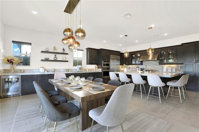 109 Ritual, Irvine, CA 92618 - dining area featuring wine cooler, plenty of natural light, and recessed lighting