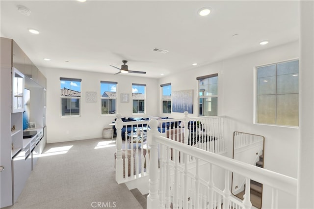 109 Ritual, Irvine, CA 92618 - corridor with an upstairs landing, carpet floors, recessed lighting, and healthy amount of natural light