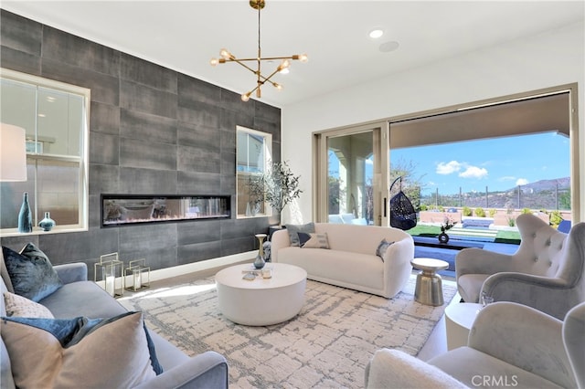 109 Ritual, Irvine, CA 92618 - living room with a chandelier, a fireplace, and recessed lighting